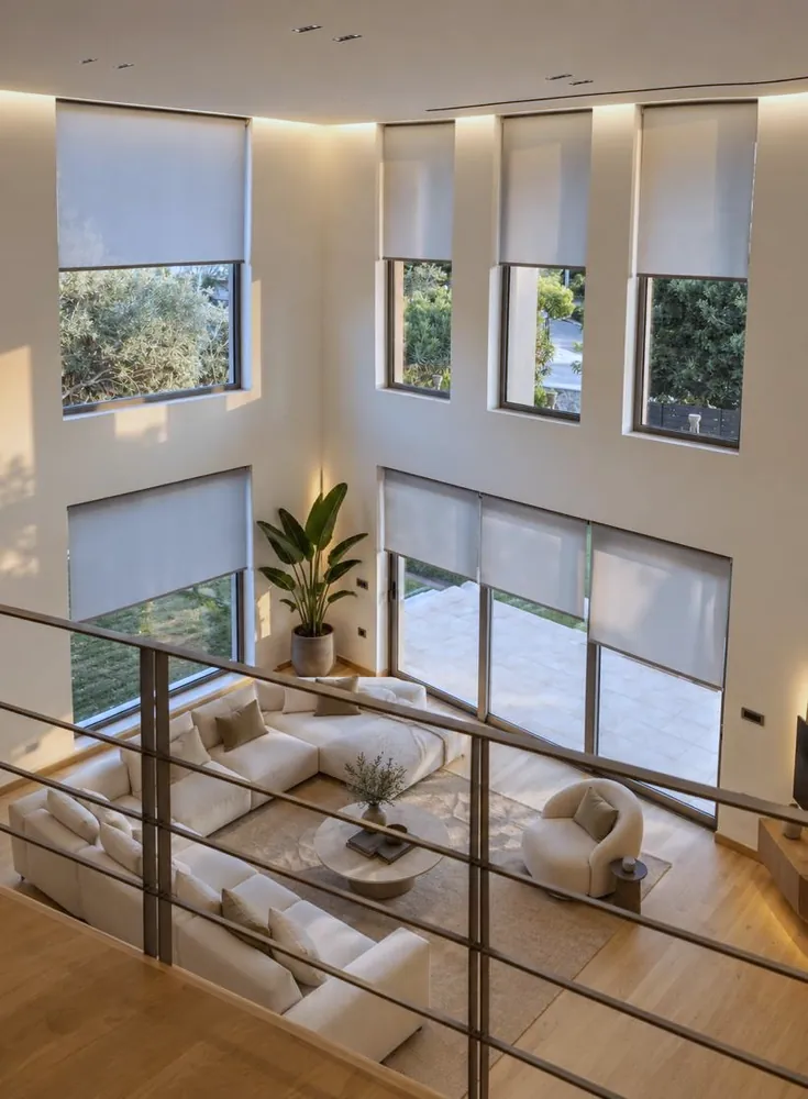 Double-height living room seen from the gallery